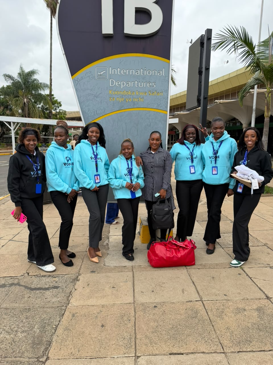 Vone Travel Solutions team seeing off a client at the airport
